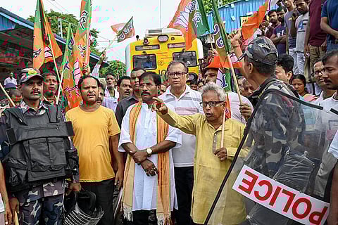 BJP's Bengal Bandh: BJP MP Jagannath Sarkar along with party workers block railway tracks at Shantipur station in Nadia